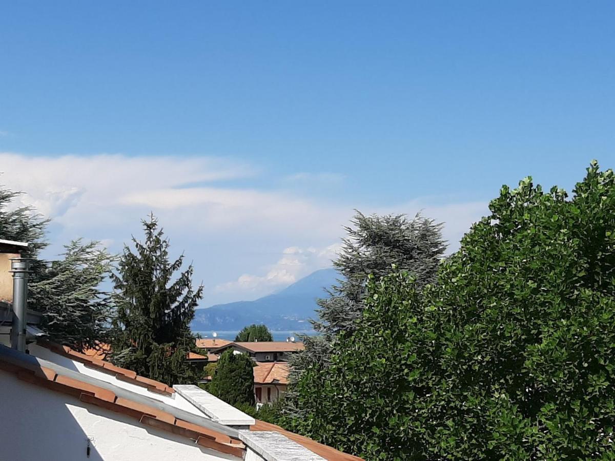 Appartamento Genziana - Con Vista Piscina E Garage Sirmione Eksteriør bilde